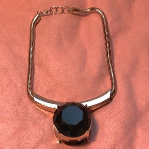 The big stone necklace brings great peace